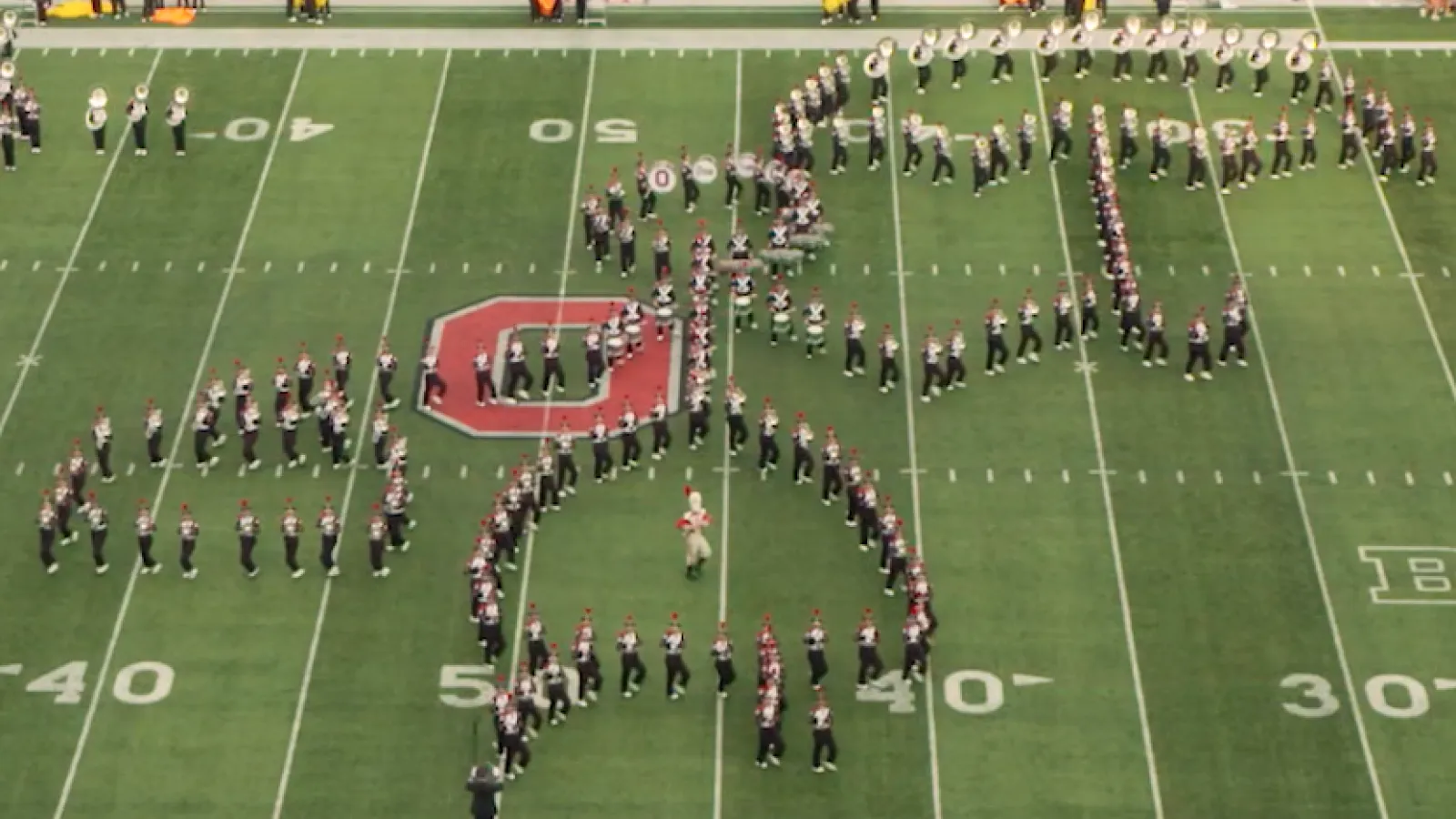 Marching band forms Mary Poppins on the field